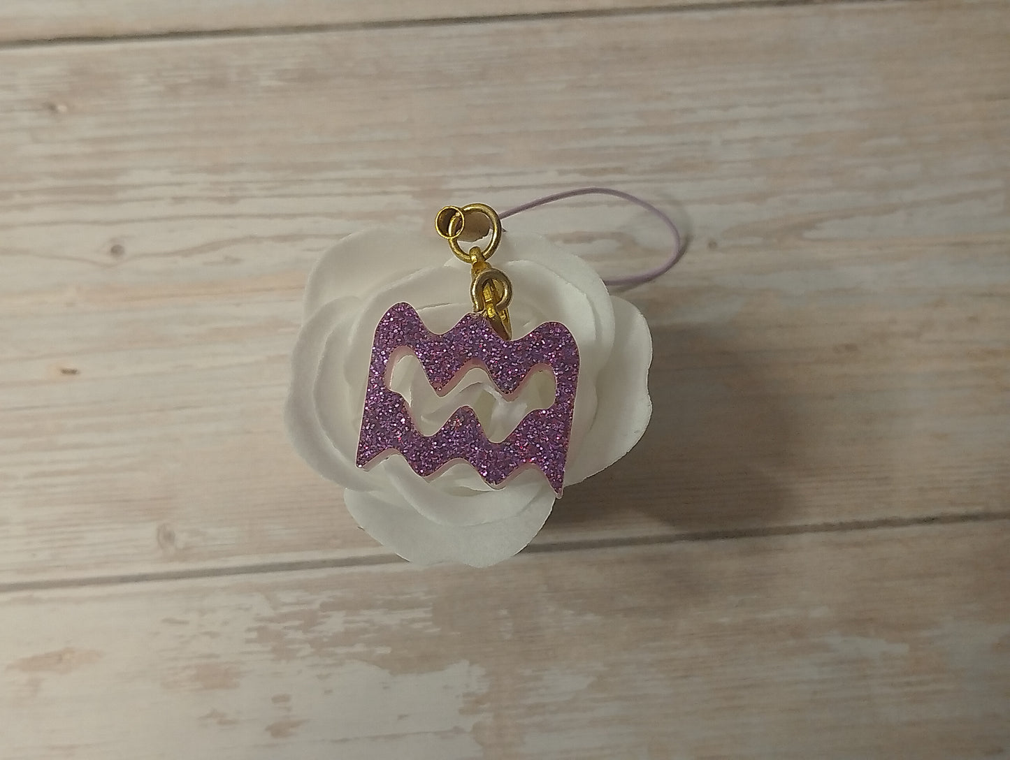 Signe Violet pailleté