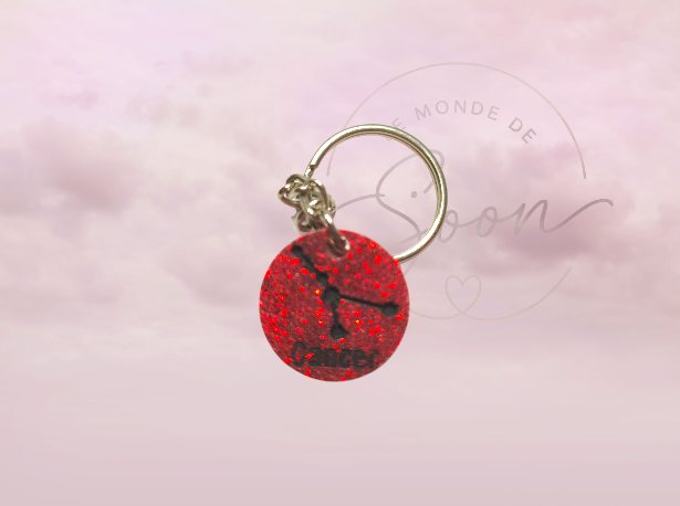 Fond Rouge pailleté, Ecriture Noir